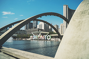 City Hall and the Toronto sign | Click here to learn more